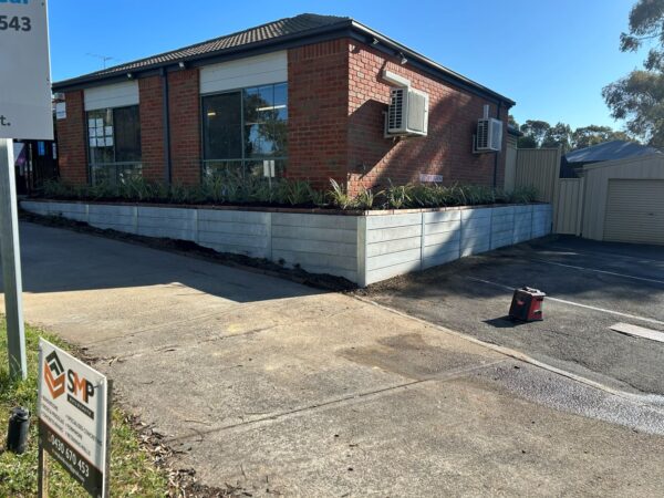 Commercial Curb Appeal: Modernizing Tired Retaining Walls — SMP Buildcrete